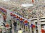 Workers push carts full of merchandise at the Amazon.com Phoenix Fulfillment Center in 2010. Workers push carts full of merchandise at the Amazon.com Phoenix Fulfillment Center in 2010.