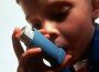 child using an asthma inhaler child using an asthma inhaler